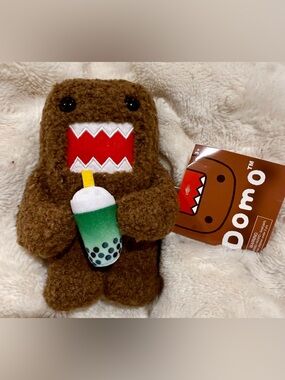 Domo plush with boba bubble drink